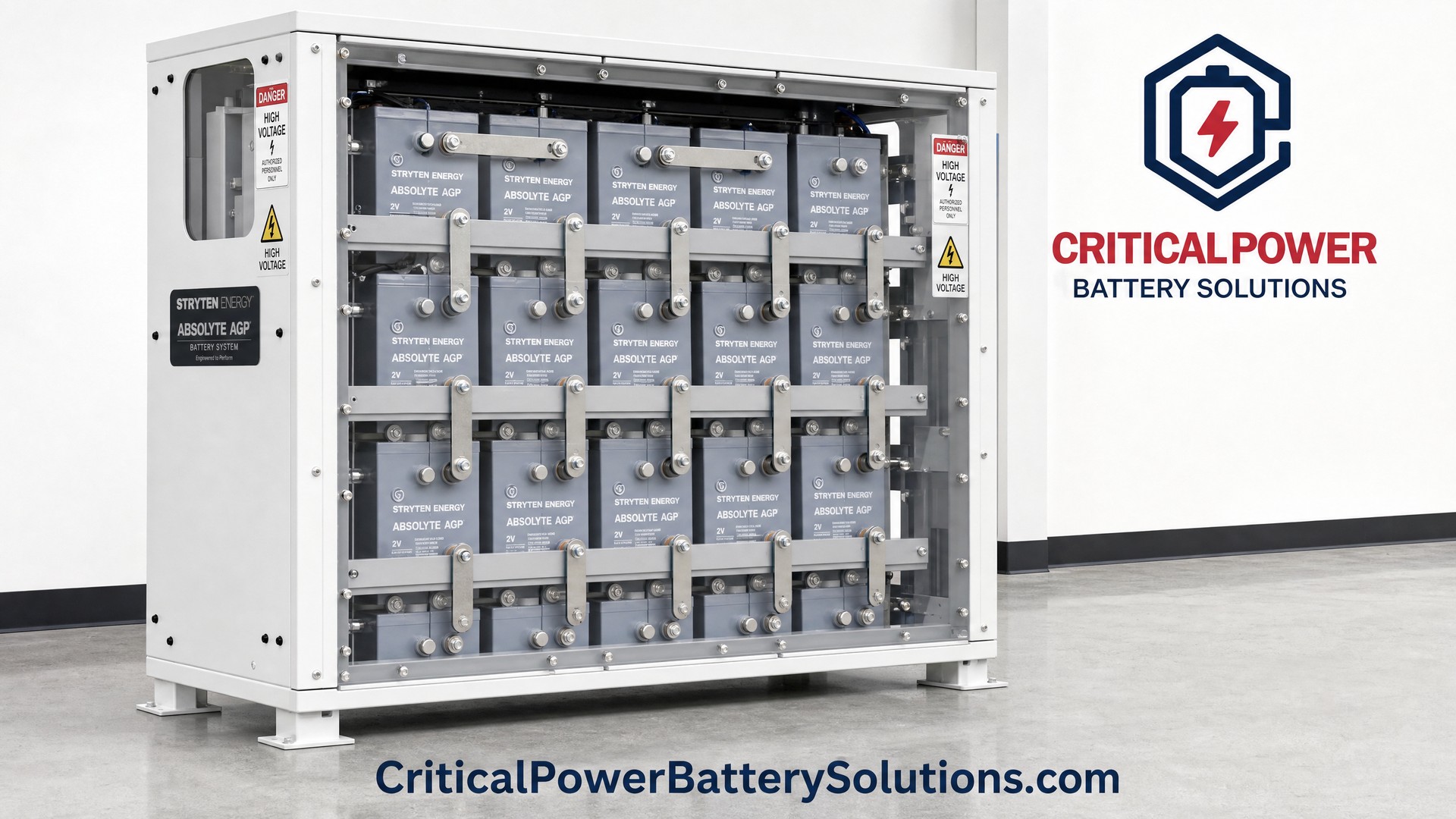 Stryten Energy Absolyte AGP 2V VRLA battery system in white powder-coated steel cabinet enclosure showing 15 cells with stainless steel terminals and aluminum bus bars.