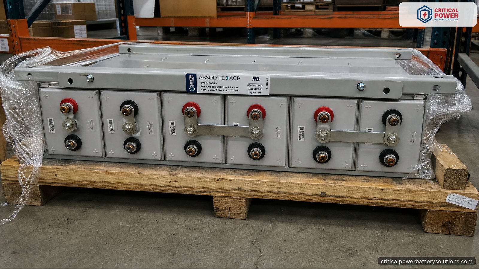 Absolyte battery delivery: new Stryten AGP module palletized for UN 2800 ground freight New Stryten Absolyte AGP module shrink wrapped on a pallet in a warehouse, ready for UN 2800 ground freight after an absolyte battery purchase